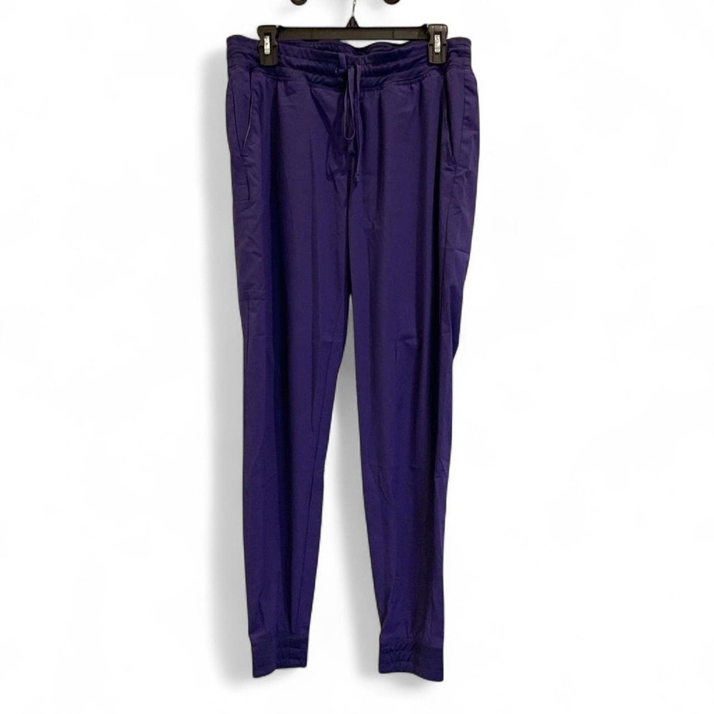 Scrub Joy purple joggers with pockets,‎ drawstring waist and tapered fit